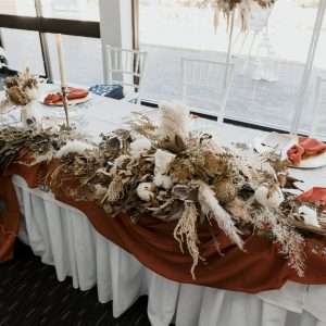 Rust, teracotta, rustic, boho, neutral tone eartly florals. Hire florals arrangements. lux glamour range