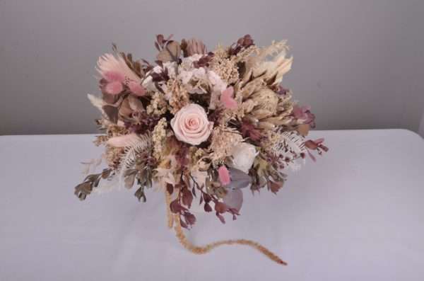 view from above. pink centrepiece. dried and preserved flowers. king protea