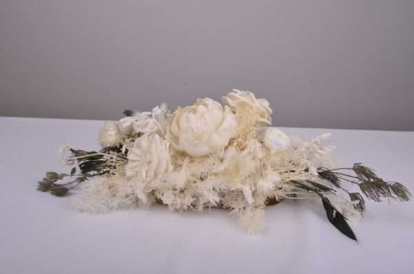 small linear arrangement. Signing table. sign. hire florals . dried and preserved flowers