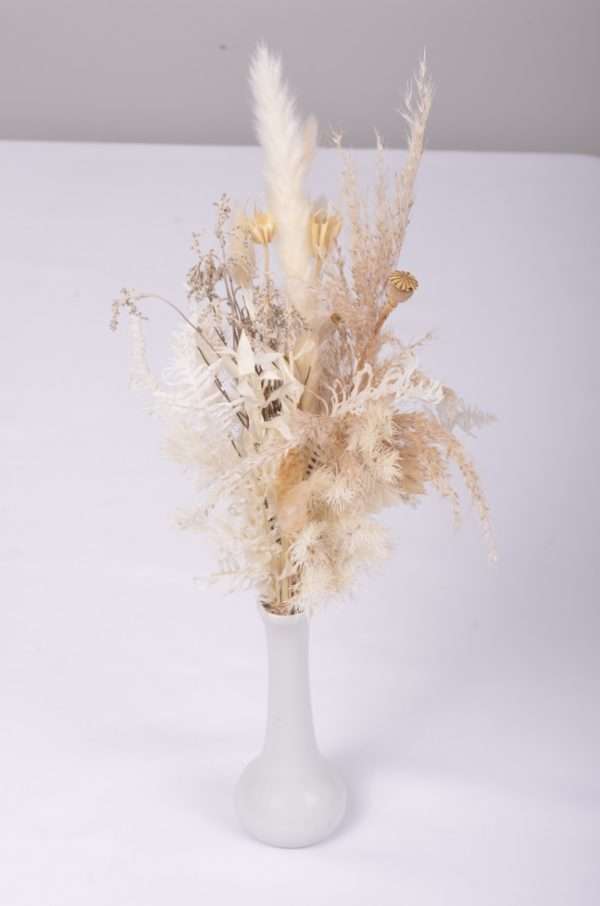 upright mini spray of dried and preserved florals. hire item. budvase.