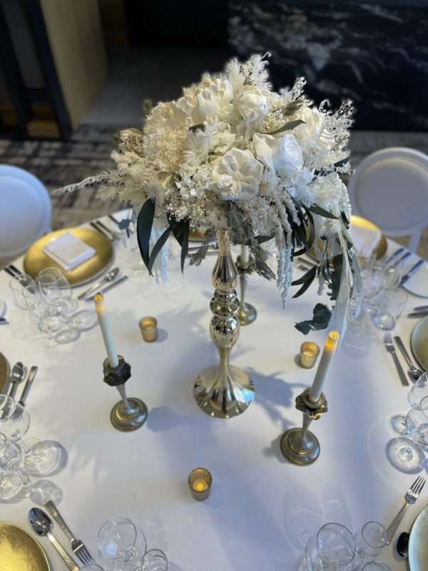 hire wedding reception table centrepiece. white wedding floral arrangement. white wedding floral table centrepiece. white and gold wedding flower centrepiece.