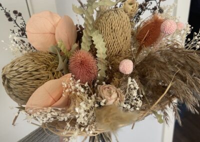 Preserved Floral Bunch-in round raffia collar – natural with pink peach tones