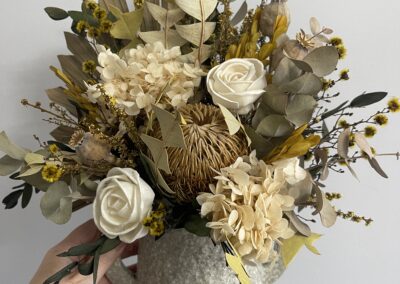 Medium green ivory natural tones preserved floral arrangement