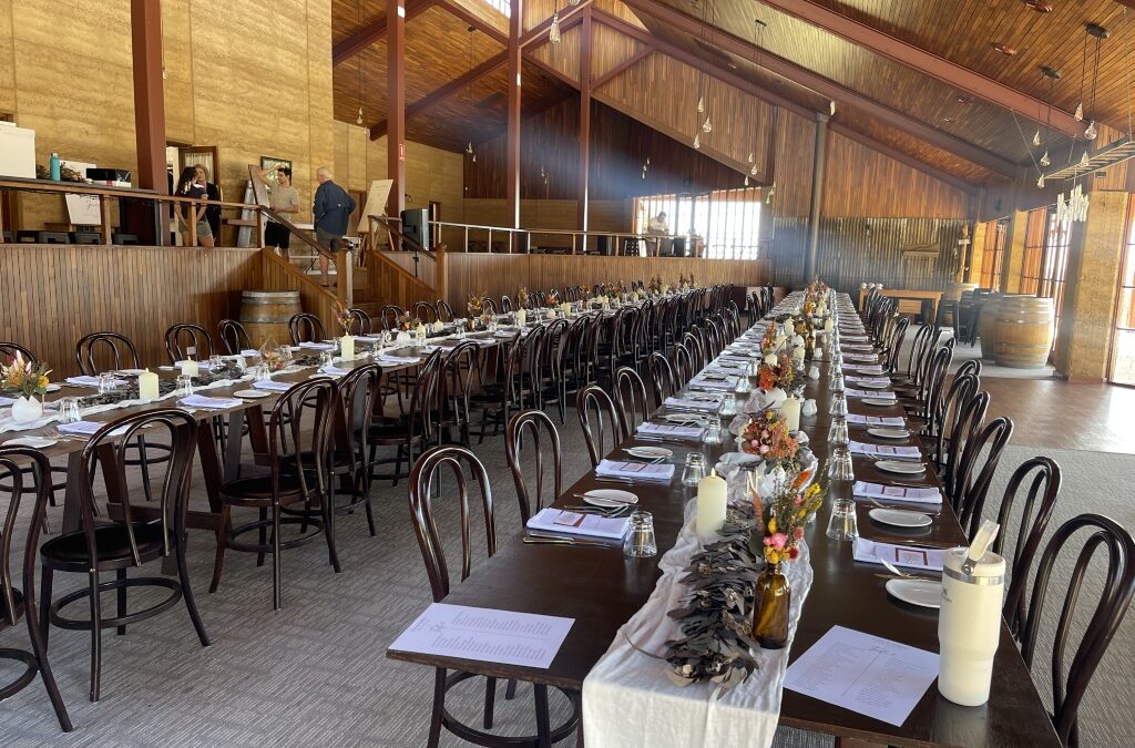 Long table with Eucalyptus garlands& NATIVE RANGE